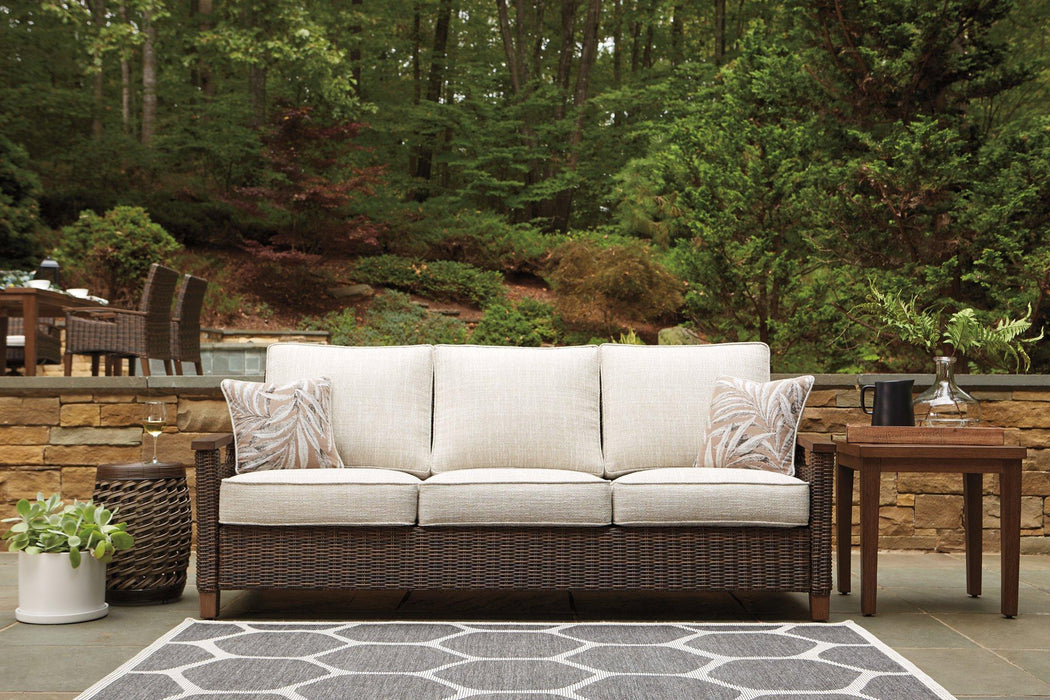 Paradise Trail Sofa with Cushion Outdoor Seating Ashley Furniture