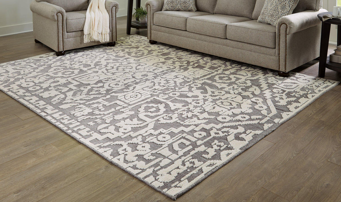 Oddetteley 7'10" x 10'1" Rug Rug Ashley Furniture