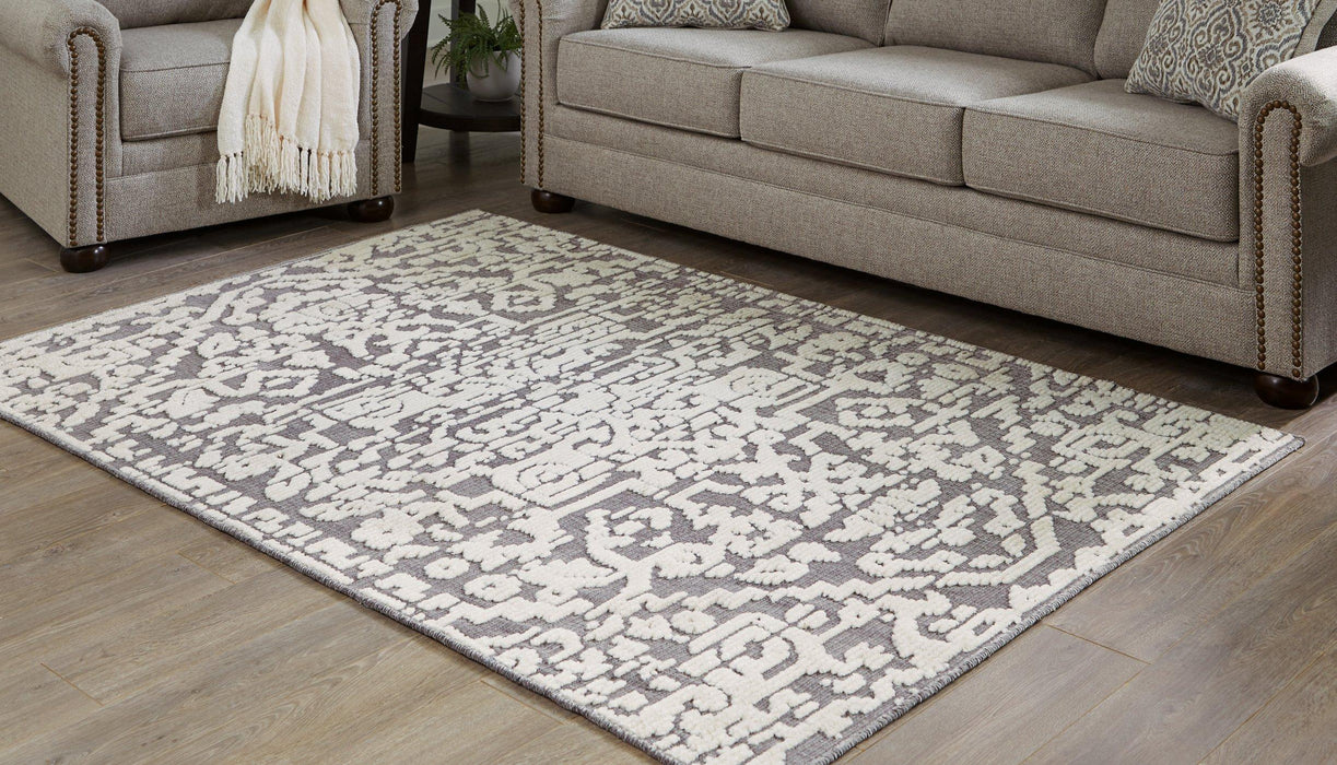 Oddetteley 4'11" x 7'2" Rug Rug Ashley Furniture