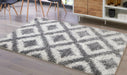 Junette 5'3" x 7'3" Rug Rug Ashley Furniture