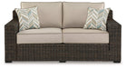 Coastline Bay Outdoor Loveseat with Cushion Outdoor Seating Ashley Furniture