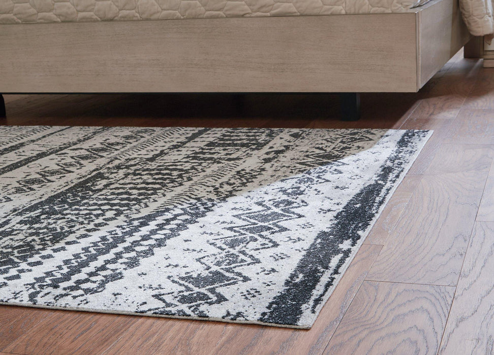 Devman 5'2" x 6'10" Rug Rug Ashley Furniture