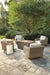 Beachcroft Beachcroft Fire Pit Table with Four Nuvella Swivel Lounge Chairs Outdoor Seating Set Ashley Furniture