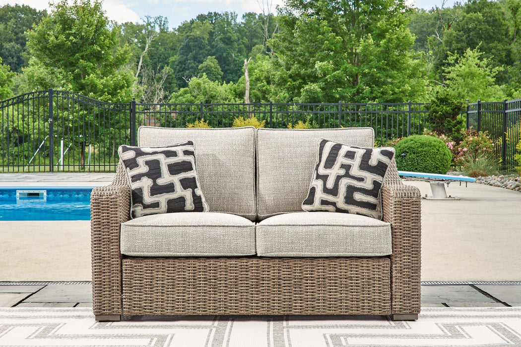 Beachcroft Outdoor Loveseat with Cushion Outdoor Loveseat Ashley Furniture