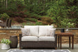 Paradise Trail Loveseat with Cushion Outdoor Seating Ashley Furniture