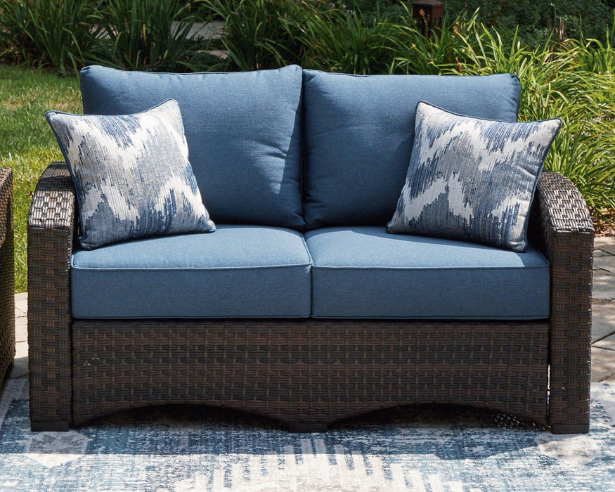 Windglow Outdoor Loveseat with Cushion Outdoor Seating Ashley Furniture