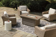 Beachcroft Beachcroft Fire Pit Table with Four Nuvella Swivel Lounge Chairs Outdoor Seating Set Ashley Furniture