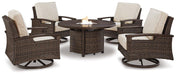 Paradise Trail Paradise Trail Fire Pit Table with 4 Nuvella Swivel Lounge Chairs Outdoor Seating Set Ashley Furniture