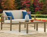 Fynnegan Outdoor Loveseat with Table (Set of 2) Outdoor Seating Set Ashley Furniture