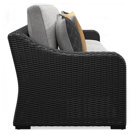 Beachcroft 2-Piece Outdoor Loveseat with Cushion Outdoor Seating Ashley Furniture