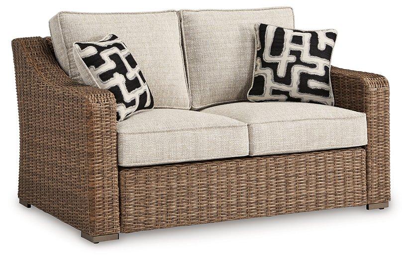 Beachcroft Outdoor Loveseat with Cushion Outdoor Loveseat Ashley Furniture