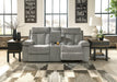 Mitchiner Reclining Loveseat with Console Loveseat Ashley Furniture