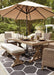 Beachcroft Dining Table with Umbrella Option Outdoor Dining Table Ashley Furniture