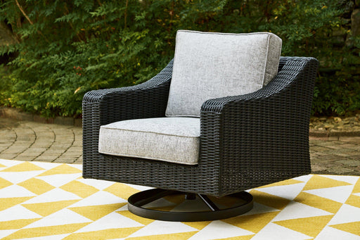 Beachcroft Outdoor Swivel Lounge with Cushion - Dayton Discount Furniture