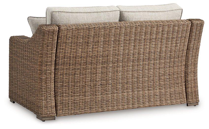 Beachcroft Outdoor Loveseat with Cushion Outdoor Loveseat Ashley Furniture