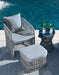 Coast Island Outdoor Chair with Ottoman and Side Table Outdoor Seating Set Ashley Furniture