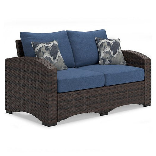 Windglow Outdoor Loveseat with Cushion Outdoor Seating Ashley Furniture