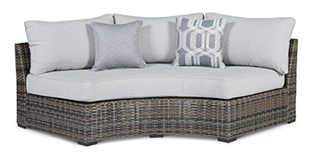 Harbor Court Curved Loveseat with Cushion Outdoor Seating Ashley Furniture
