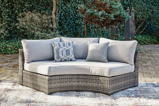 Harbor Court Curved Loveseat with Cushion Outdoor Seating Ashley Furniture