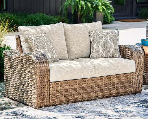 Sandy Bloom Outdoor Loveseat with Cushion Outdoor Seating Ashley Furniture