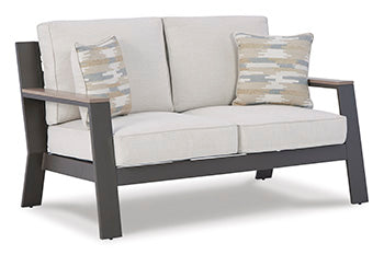 Tropicava Outdoor Loveseat with Cushion Outdoor Seating Ashley Furniture