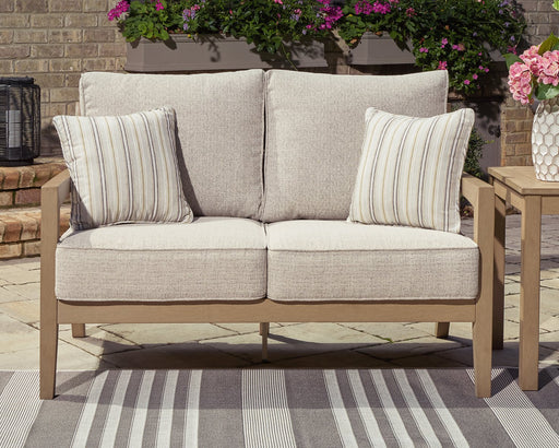 Hallow Creek Outdoor Loveseat with Cushion Outdoor Seating Ashley Furniture