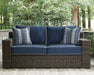 Grasson Lane Grasson Lane Nuvella Loveseat and 2 Lounge Chairs with Fire Pit Table Outdoor Table Set Ashley Furniture