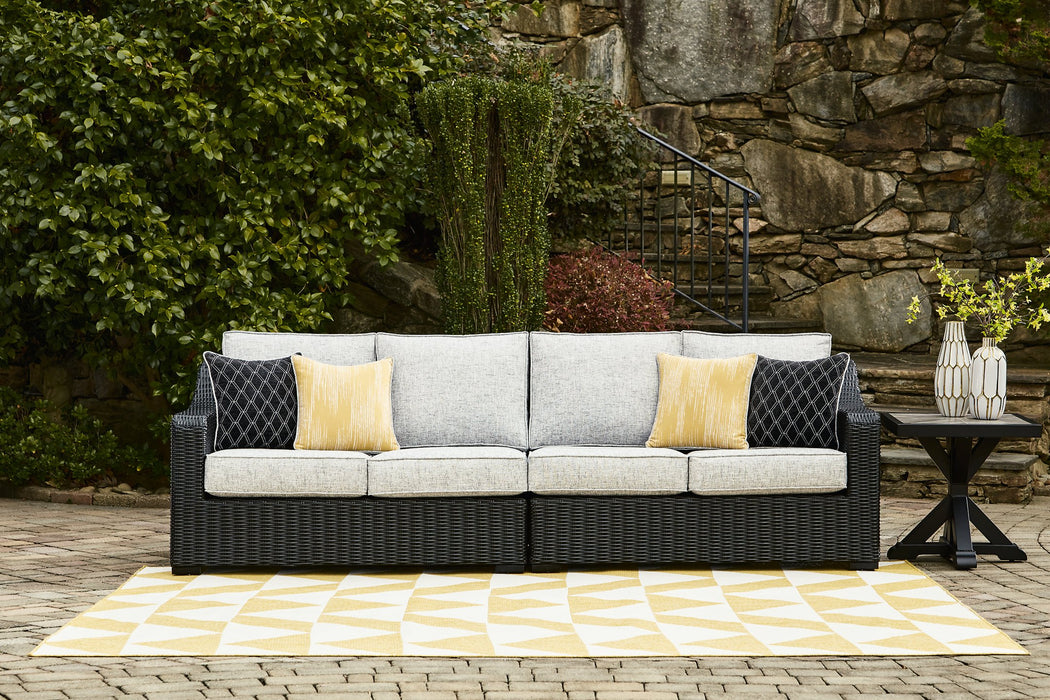 Beachcroft 2-Piece Outdoor Loveseat with Cushion Outdoor Seating Ashley Furniture