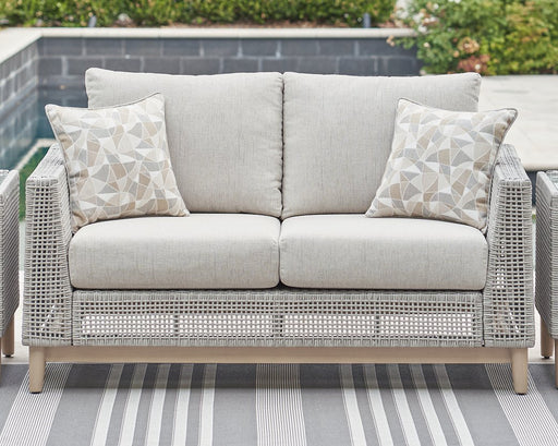 Seton Creek Outdoor Loveseat with Cushion Outdoor Seating Ashley Furniture